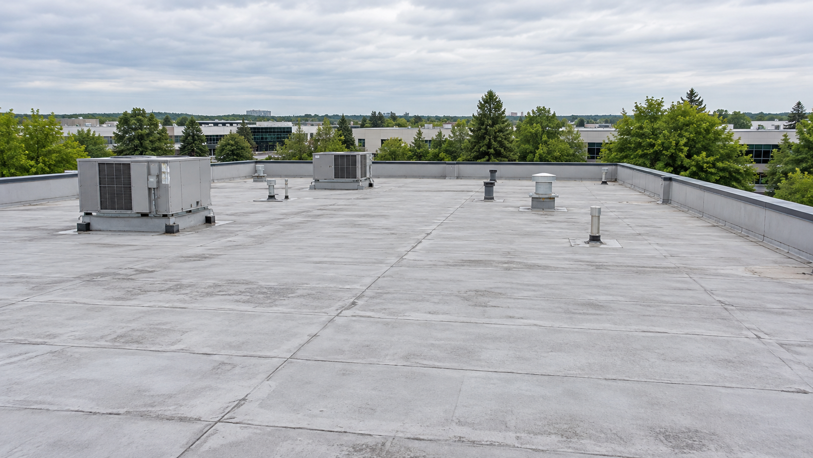 Illustration of a commercial membrane roof with parapet coping and rooftop equipment